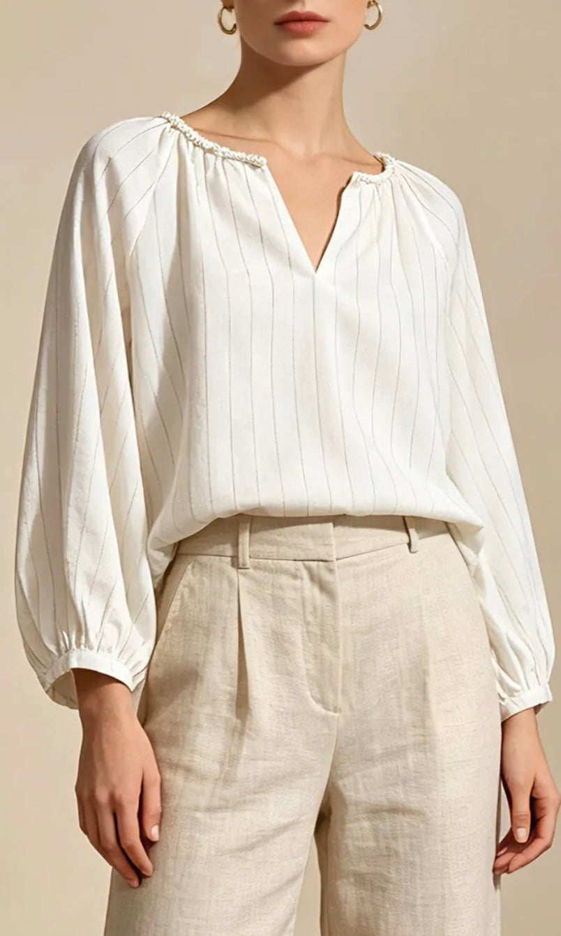 Blusa a rayas con cuello fruncido